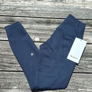 Lululemon Wunder Train High-Rise Tight‎ Pockets 25"
True Navy Blue size 4 NWT